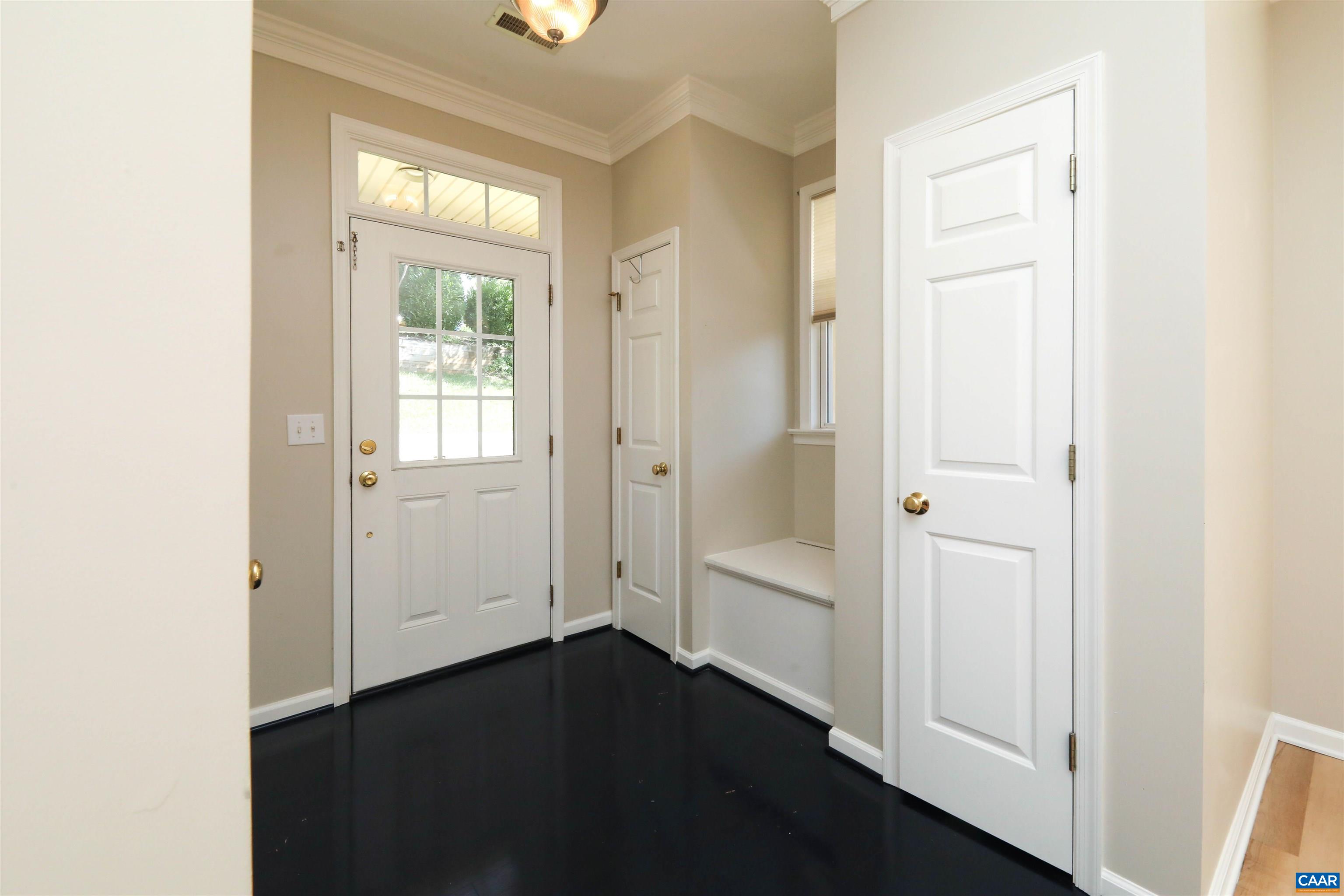 1342 Stoney Ridge Road Charlottesville, VA 22902 - Photo 5 of 47 an empty room with wooden floor closet and windows