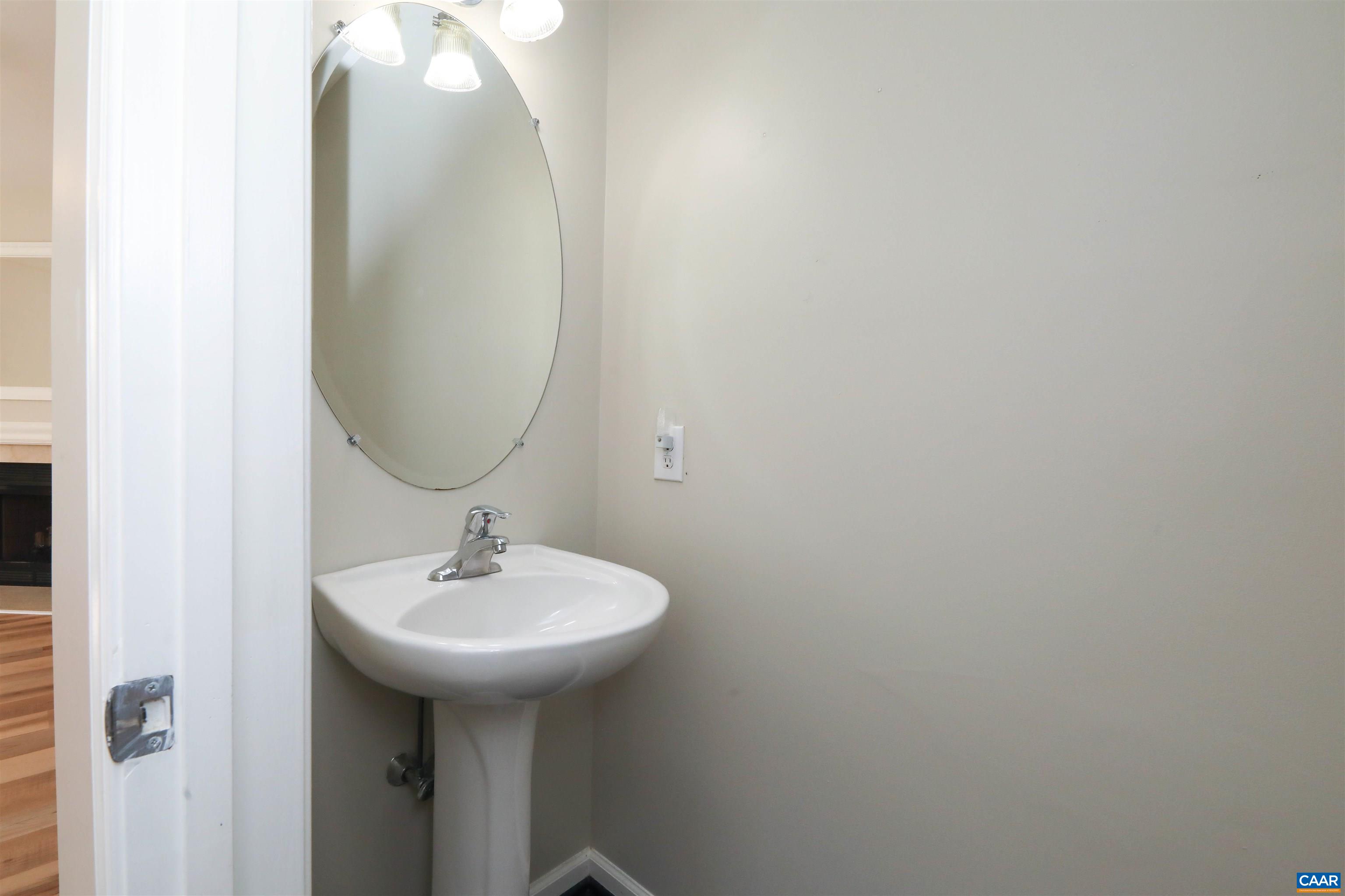 1342 Stoney Ridge Road Charlottesville, VA 22902 - Photo 6 of 47 a bathroom with a sink and a mirror