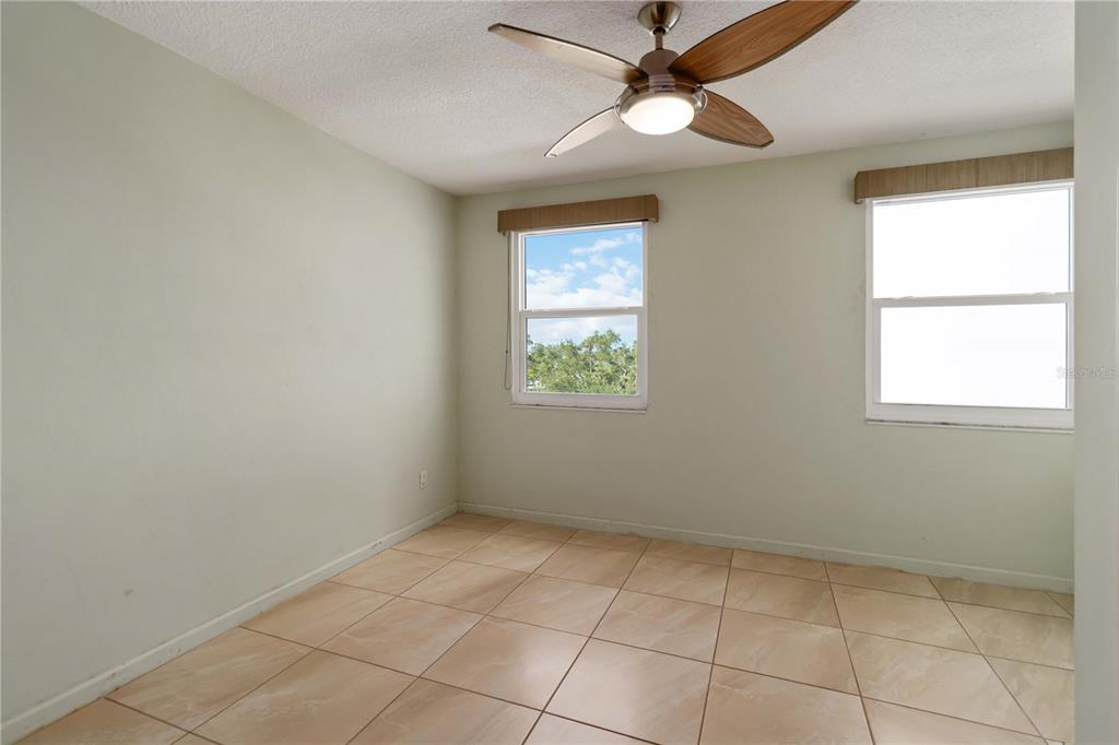 33 South Gulfstream Avenue, Unit 502 Sarasota, FL 34236 - Photo 13 of 23 a view of an empty room with a window