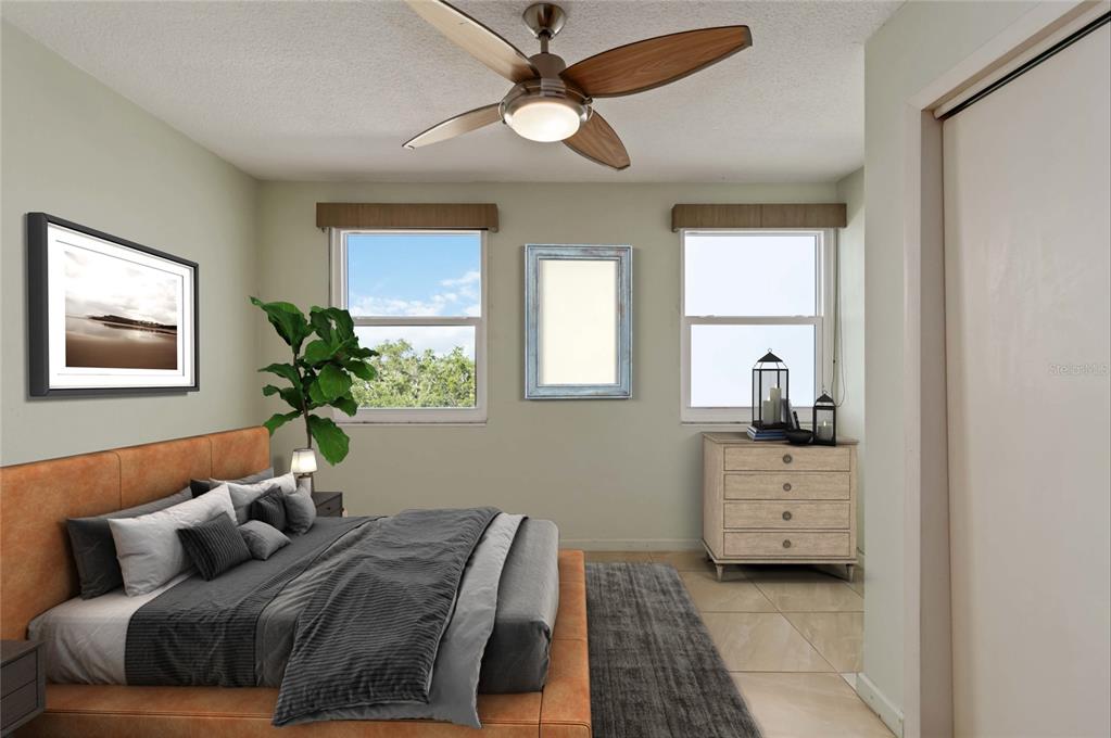 33 South Gulfstream Avenue, Unit 502 Sarasota, FL 34236 - Photo 14 of 23 a bedroom with furniture and a window