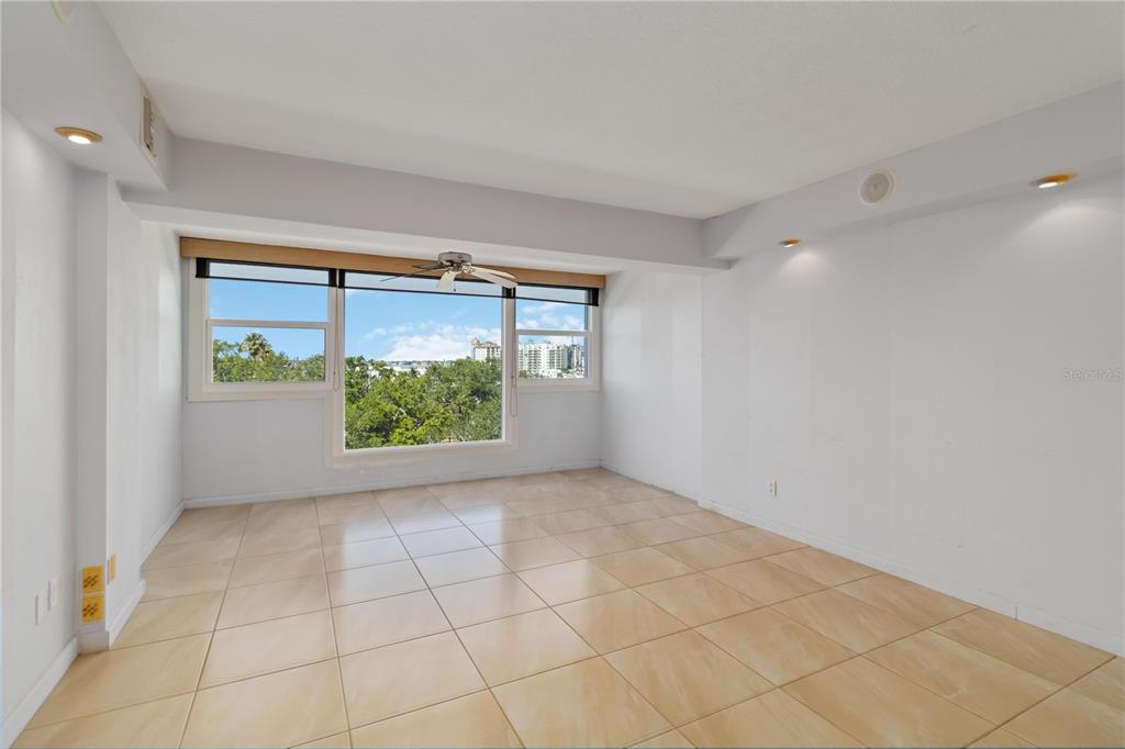33 South Gulfstream Avenue, Unit 502 Sarasota, FL 34236 - Photo 9 of 23 a view of room with window and front door