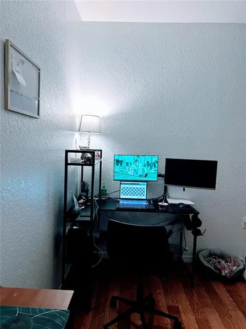 a view of balcony with furniture