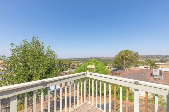 a view of a balcony with an outdoor space