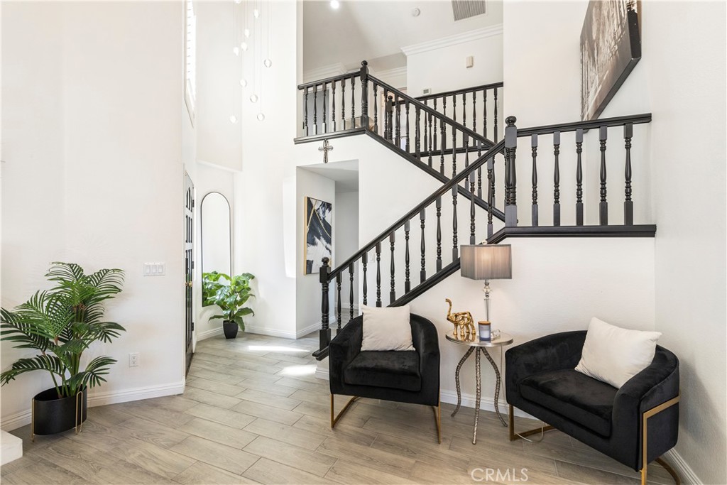 14272 Laurel Drive Riverside, CA 92503 - Photo 4 of 24 a view of entryway with wooden floor and a potted plant