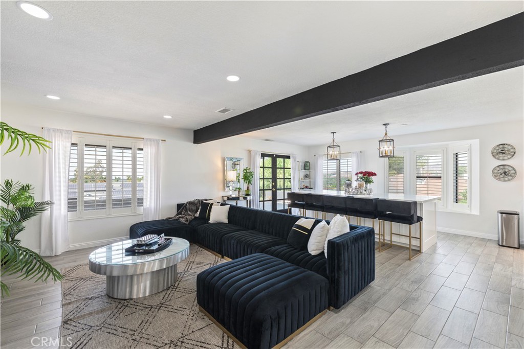 14272 Laurel Drive Riverside, CA 92503 - Photo 6 of 24 a living room with furniture and a large window