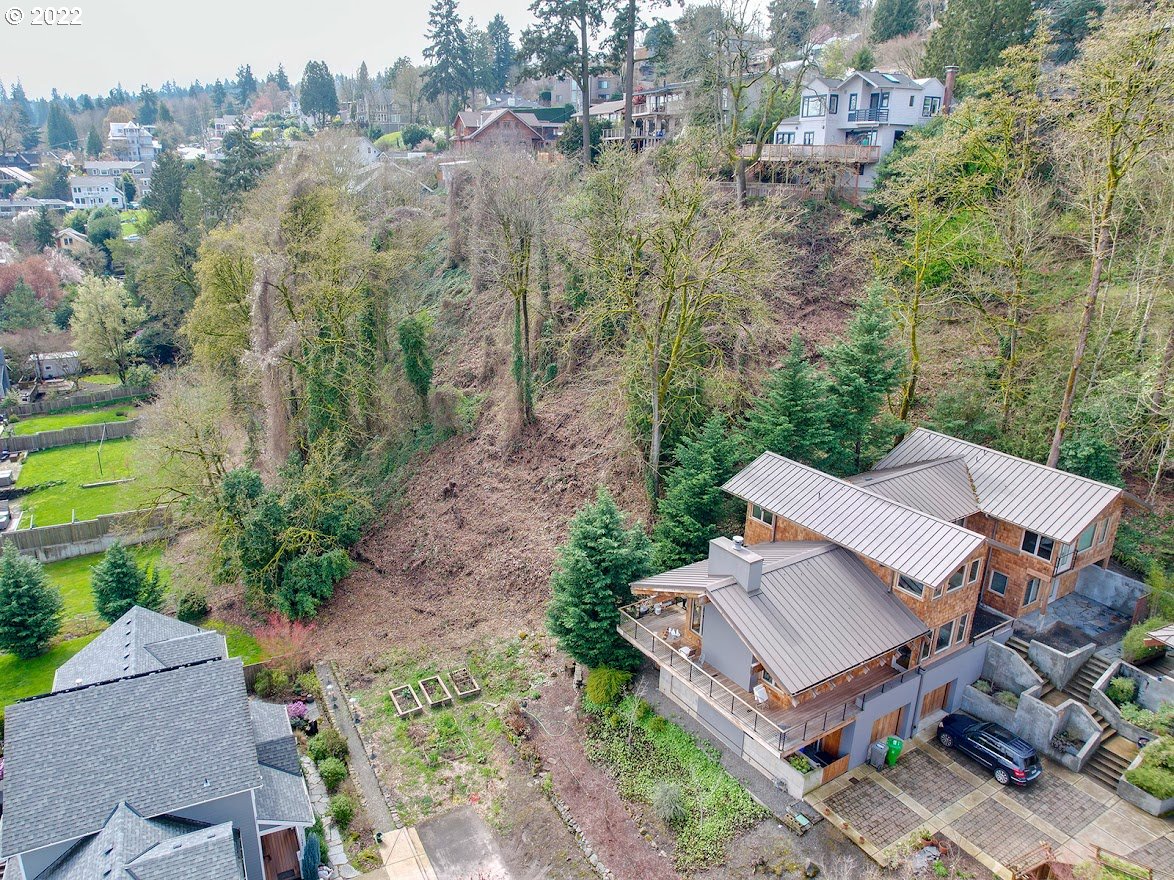 an aerial view of a house with mountain view