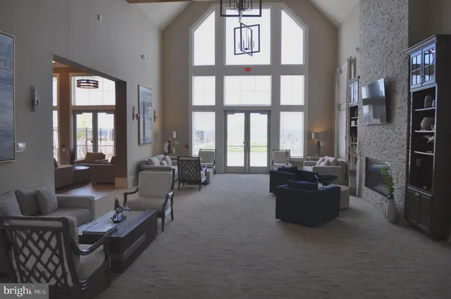 a view of a lake with houses in the background