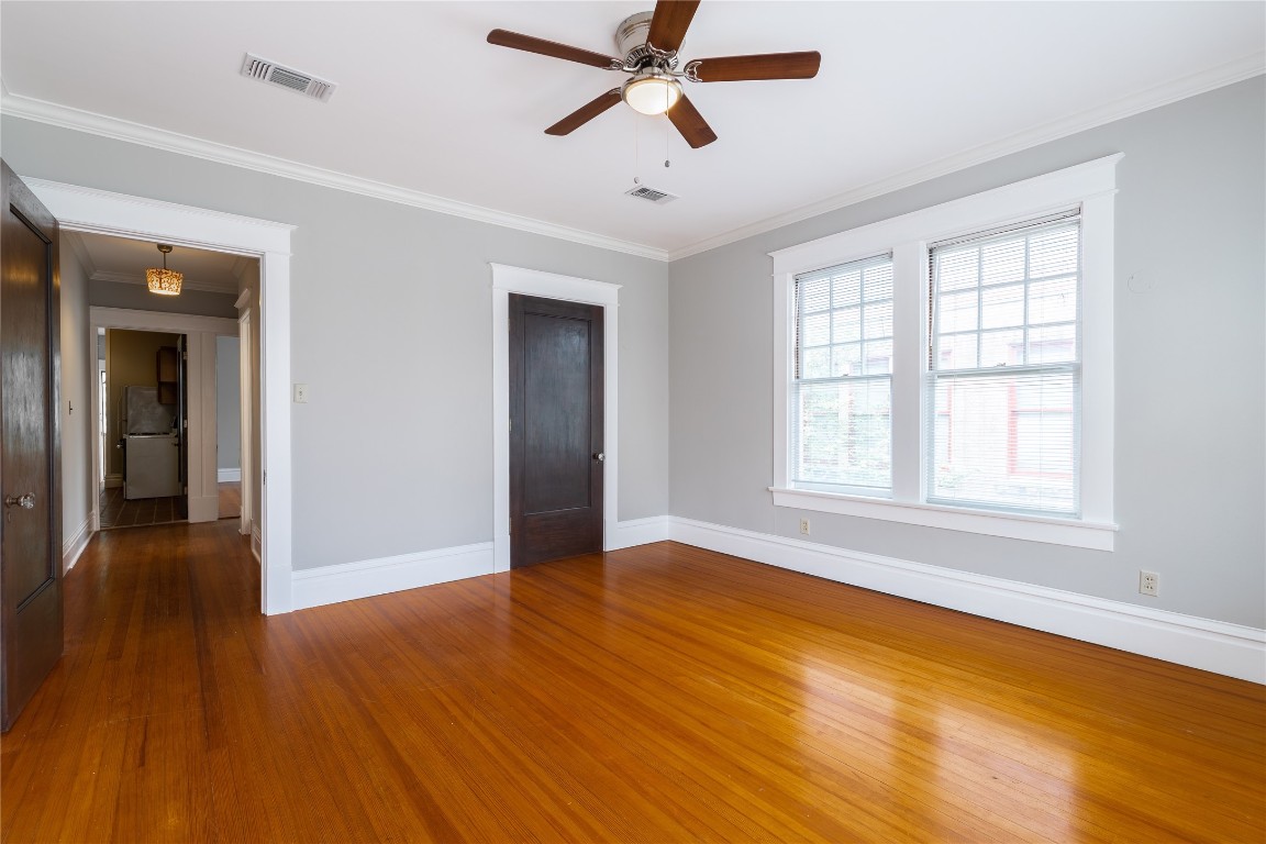 806 Winbern Street, Unit 2 Houston, TX 77002 - Photo 2 of 11 a view of empty room with wooden floor and fan