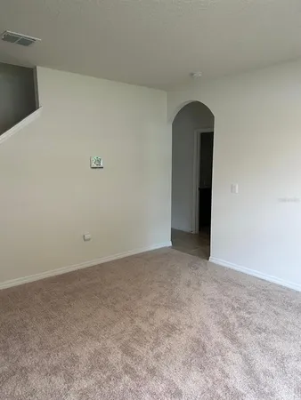 a bathroom with a shower and a toilet
