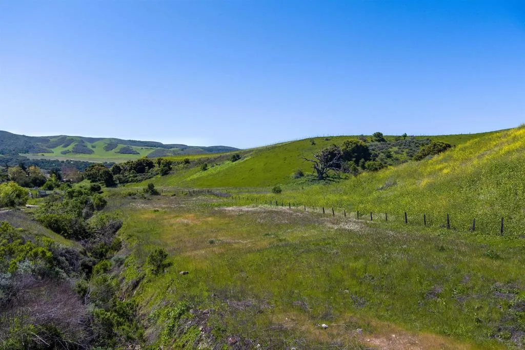 0 Sweeney Road Lompoc, CA 93436 - Photo 17 of 36 a view of a lush green outdoor space with a lake view