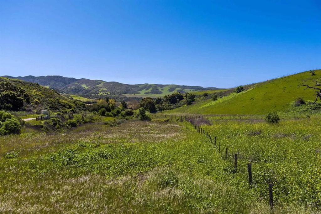 0 Sweeney Road Lompoc, CA 93436 - Photo 19 of 36 a view of a lush green outdoor space with a lake view