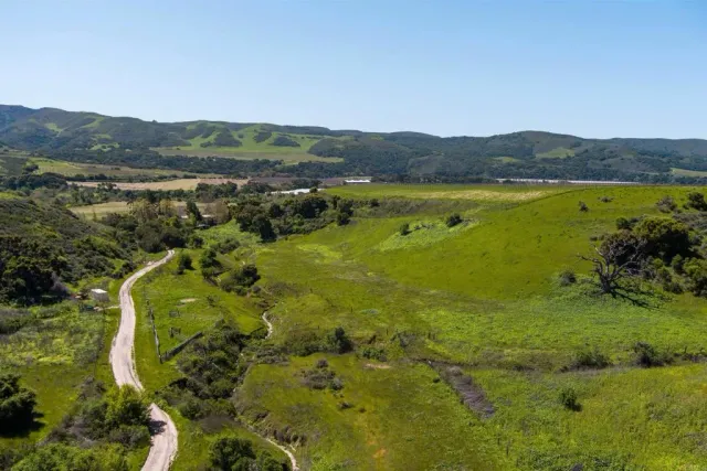 a view of a city with a lake