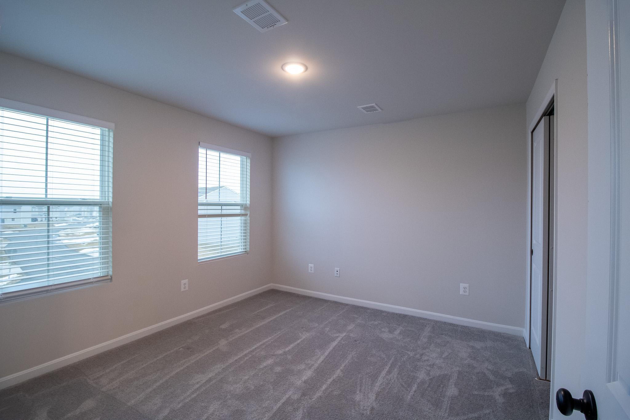 154 Diving Scaup Road Hedgesville, WV 25427 - Photo 48 of 63 Bright and airy room with natural light.