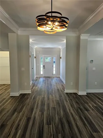 a view of wooden floor in an empty room