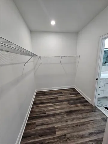 a bathroom with a toilet and a sink