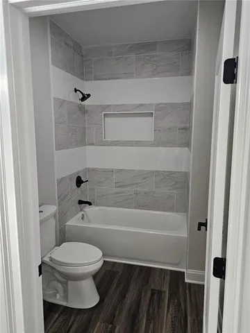 a room with a mirror and a sink