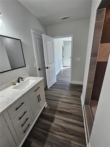 a view of a room with racks on the wall