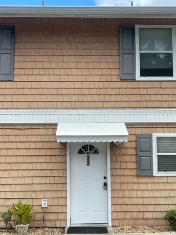 a front view of a house with a shower