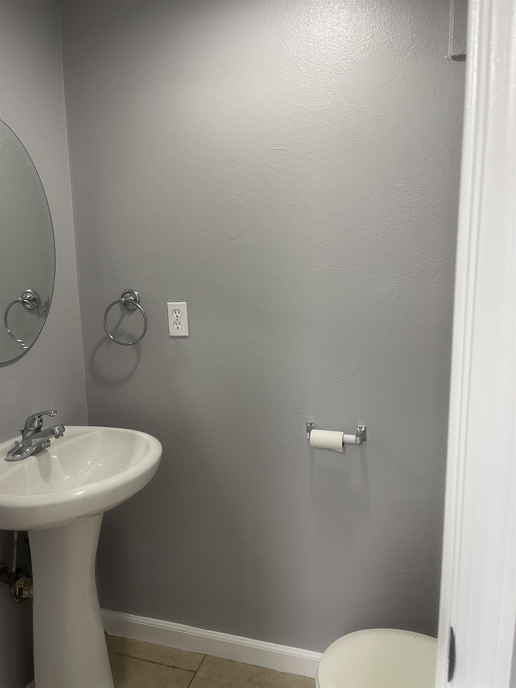 4420 Carter Road, Unit 22 St. Augustine, FL 32086 - Photo 5 of 12 a bathroom with a sink mirror and toilet