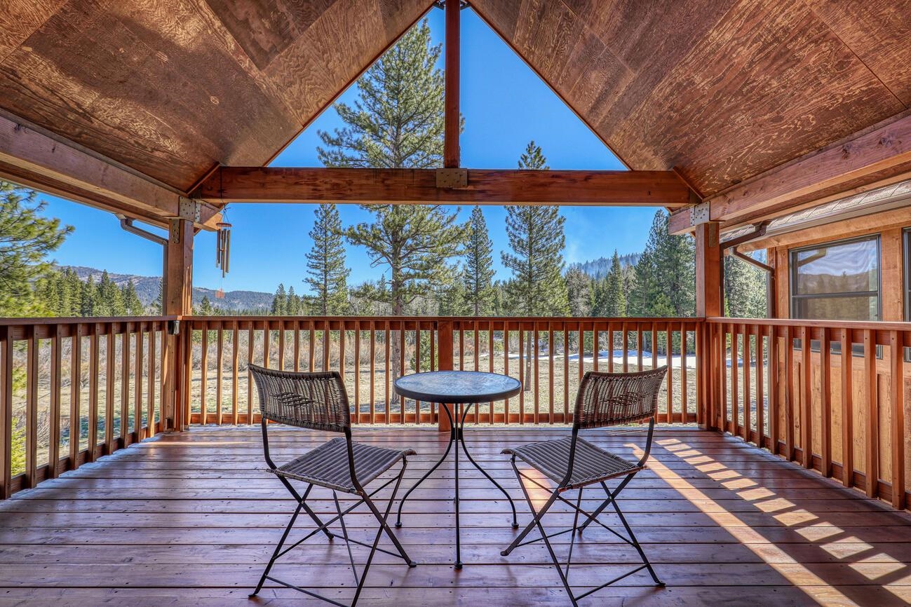 1711 Smith Lake Road Graeagle, CA 96103 - Photo 13 of 26 a view of a chairs and table in the balcony