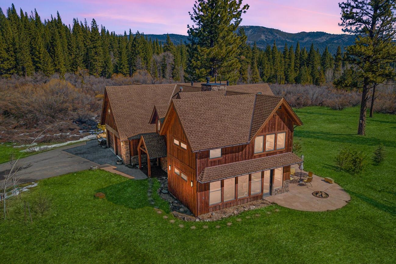 1711 Smith Lake Road Graeagle, CA 96103 - Photo 2 of 26 a view of a house with backyard and a hammock