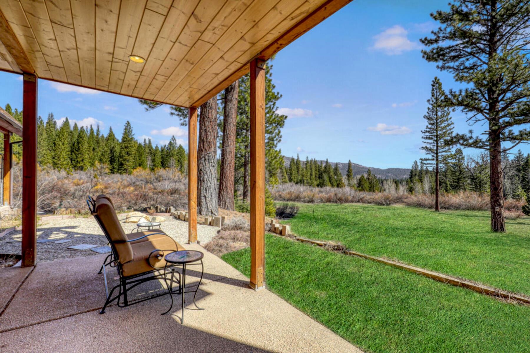 1711 Smith Lake Road Graeagle, CA 96103 - Photo 21 of 26 a view of a patio with a table and chairs