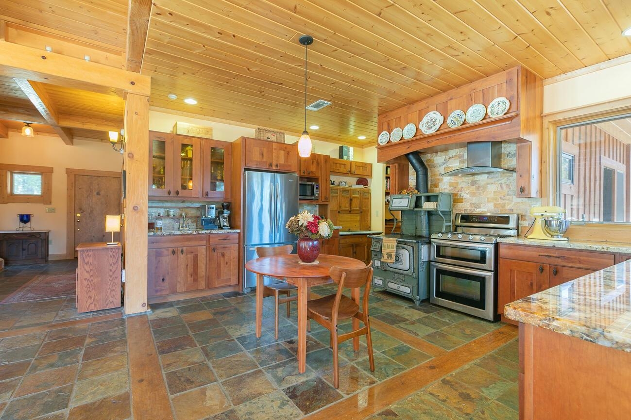 1711 Smith Lake Road Graeagle, CA 96103 - Photo 6 of 26 a outdoor space with lots of table and chairs