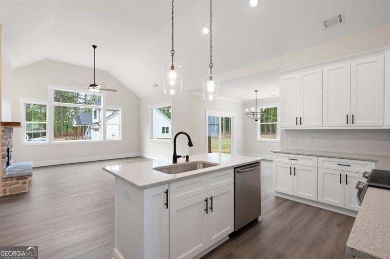 150 Doris Path Dallas, GA 30157 - Photo 16 of 36 a kitchen with sink stove and window