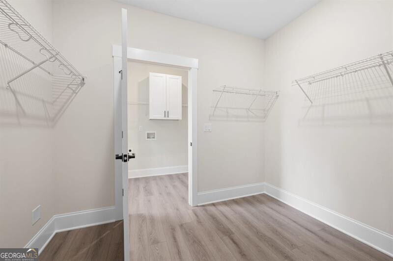 150 Doris Path Dallas, GA 30157 - Photo 22 of 36 a view of small space with wooden floor