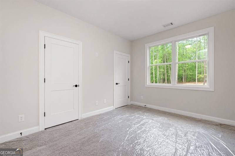 150 Doris Path Dallas, GA 30157 - Photo 24 of 36 a view of an empty room with a window
