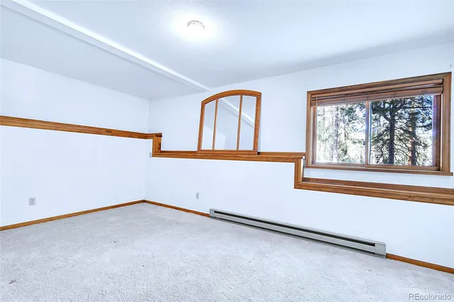 a picture of a room with furniture