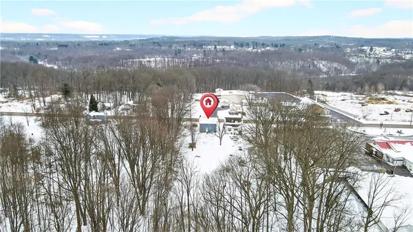 a view of a backyard of snow