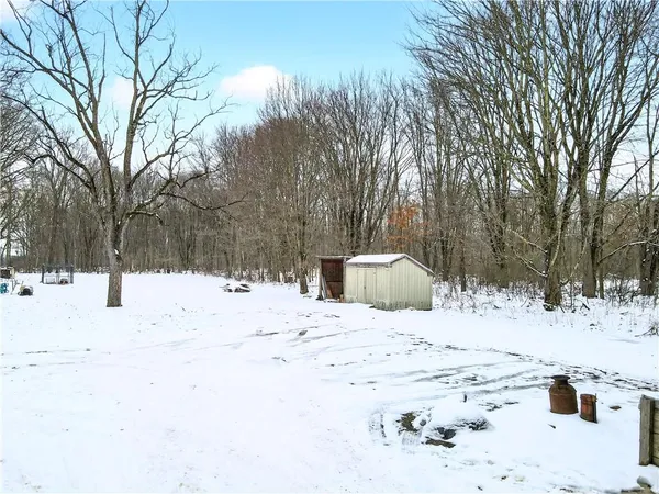 a covered view of snow with yard