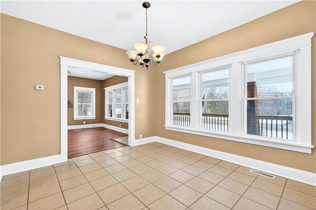 66 Conneaut Lake Road Greenville, PA 16125 - Photo 10 of 30 a view of an entryway with a chandelier