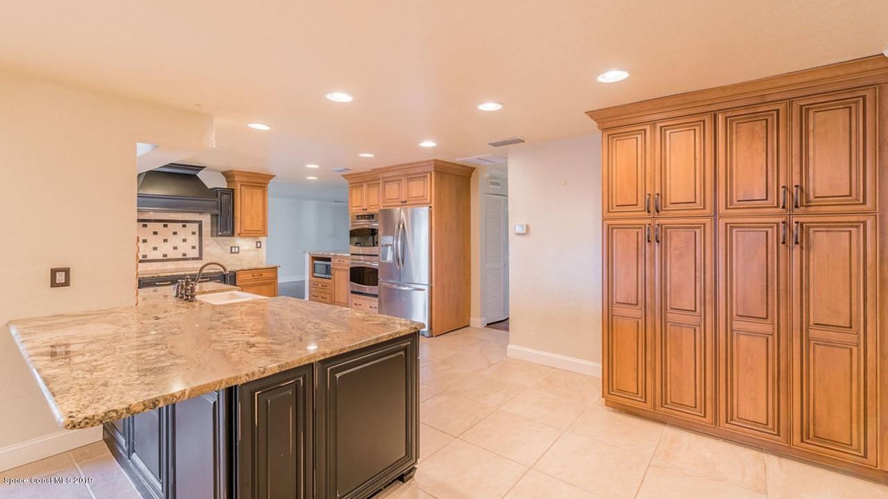 23 Country Club Road Cocoa Beach, FL 32931 - Photo 14 of 54 Breakfast Bar & Dining Area