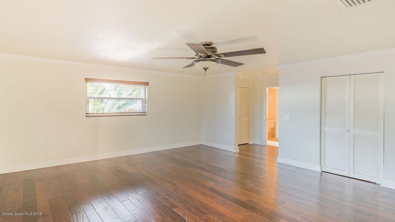 23 Country Club Road Cocoa Beach, FL 32931 - Photo 16 of 54 Light, Bright Master Bedroom