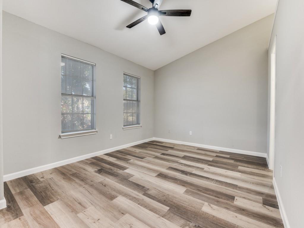 4523 Hamblen Drive Dallas, TX 75232 - Photo 18 of 25 a view of a livingroom with a ceiling fan and window