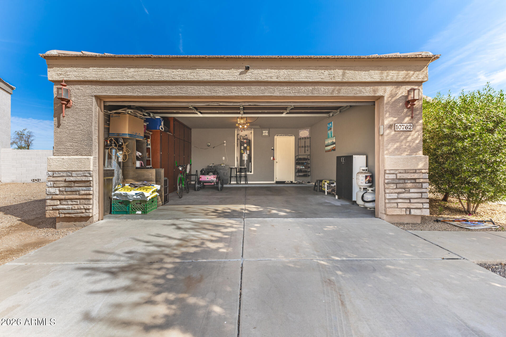 10762 West Joblanca Road Avondale, AZ 85323 - Photo 26 of 36 a view of a building with car parked