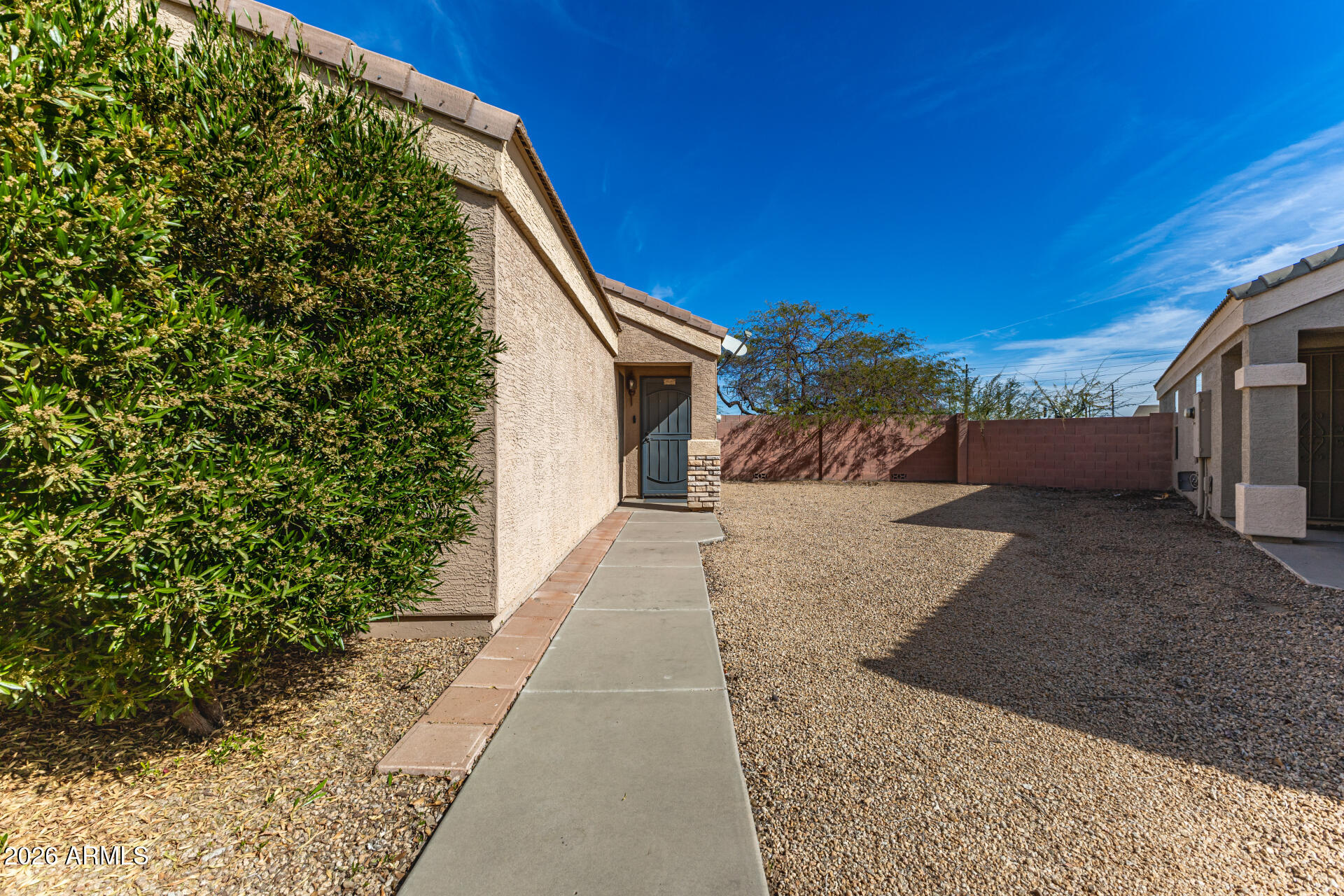 10762 West Joblanca Road Avondale, AZ 85323 - Photo 4 of 36 a view of a house with a yard