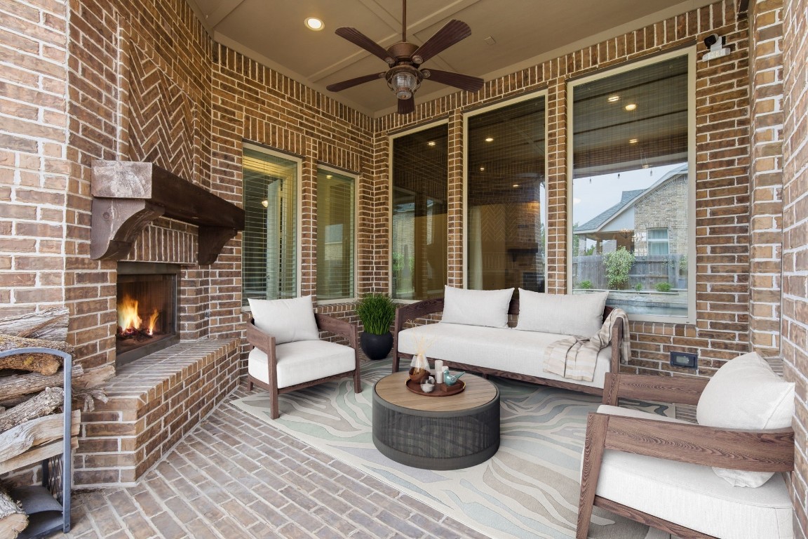 27971 Arden Trail Spring, TX 77386 - Photo 34 of 50 One of 2 cozy covered patios with fireplace. Perfect for curling up with a good book.