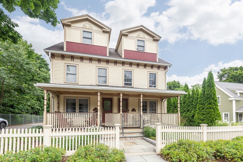 1844 Main Street, Unit 1844 Concord, MA 01742 - Photo 1 of 42 a front view of a house with a porch