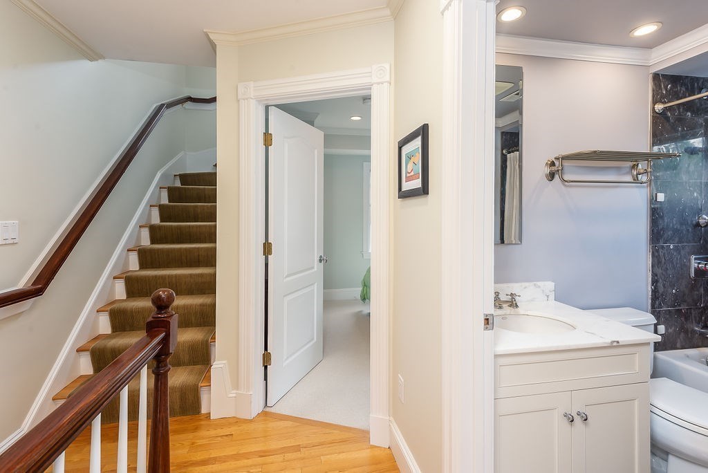 1844 Main Street, Unit 1844 Concord, MA 01742 - Photo 16 of 42 a view of a bathroom from a hallway