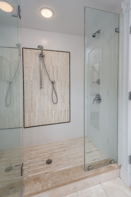 1844 Main Street, Unit 1844 Concord, MA 01742 - Photo 29 of 42 a bathroom with a glass shower door