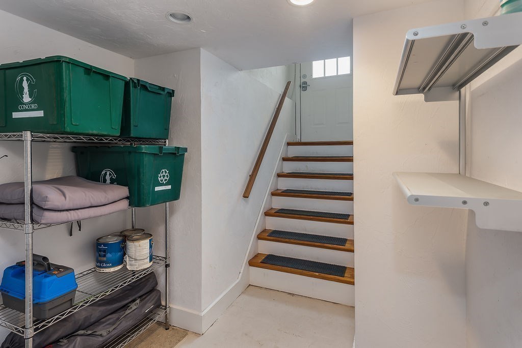 1844 Main Street, Unit 1844 Concord, MA 01742 - Photo 34 of 42 a view of entryway and hall with wooden floor