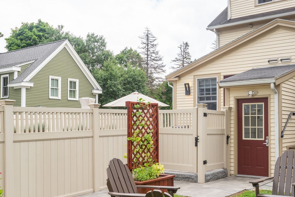 1844 Main Street, Unit 1844 Concord, MA 01742 - Photo 35 of 42 a view of a house with a yard