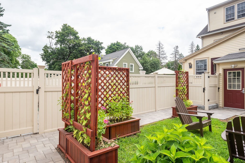 1844 Main Street, Unit 1844 Concord, MA 01742 - Photo 36 of 42 an outdoor space with garden