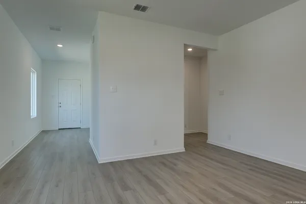 a kitchen with kitchen island microwave and stove