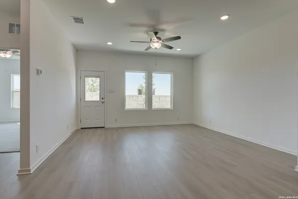 a view of kitchen with sink microwave and stove