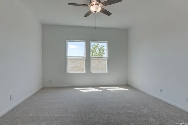 a view of a livingroom with a kitchen space