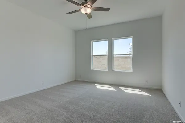 a bathroom with a double vanity sink and mirror